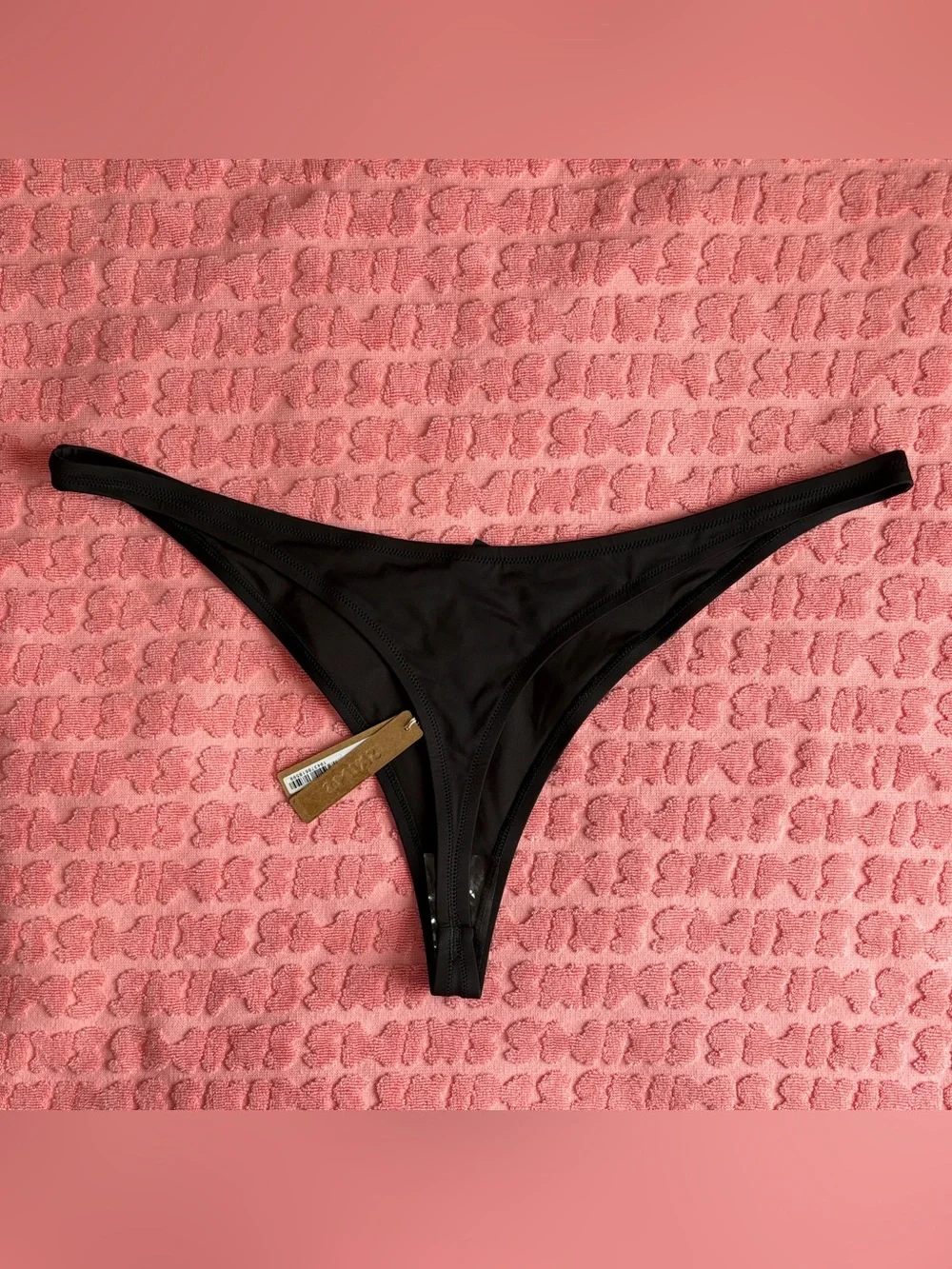 SKIMS swimwear features saturated
